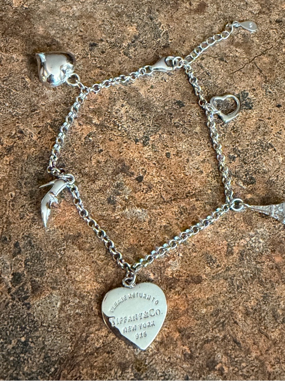 Tiffany & Co. Sterling Silver 5 Charms Bracelet 7"-8" adjustable 1960s designs.